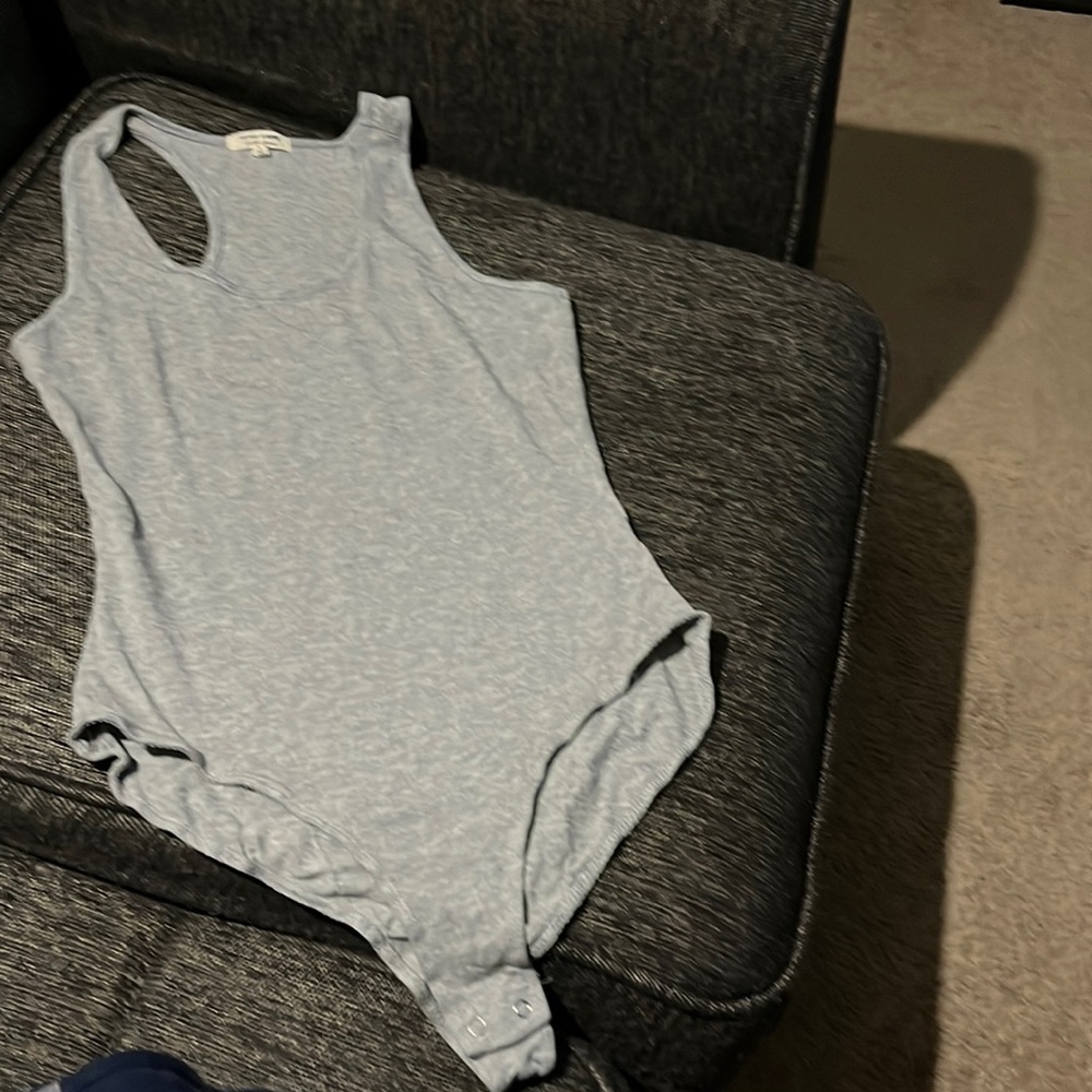 Woman’s brand new bodysuit color light grey size L no tags price 15.00